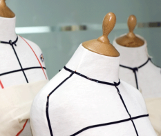Three sewing mannequins.