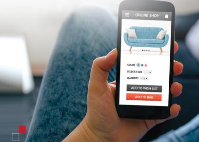 Person selecting sofa online on cell phone