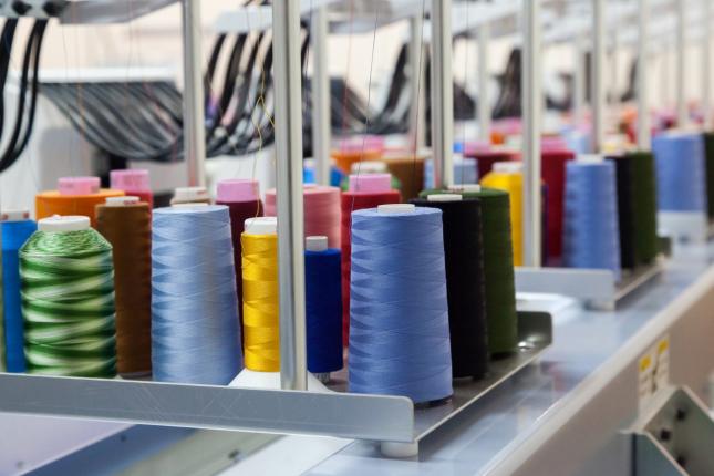 Sewing threads of different colors.