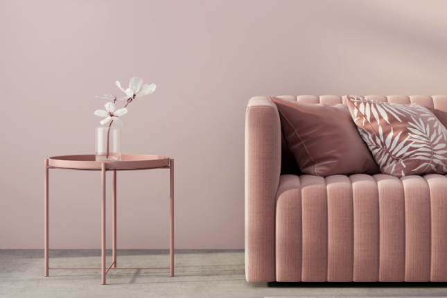 Pink modern sofa with a pink table